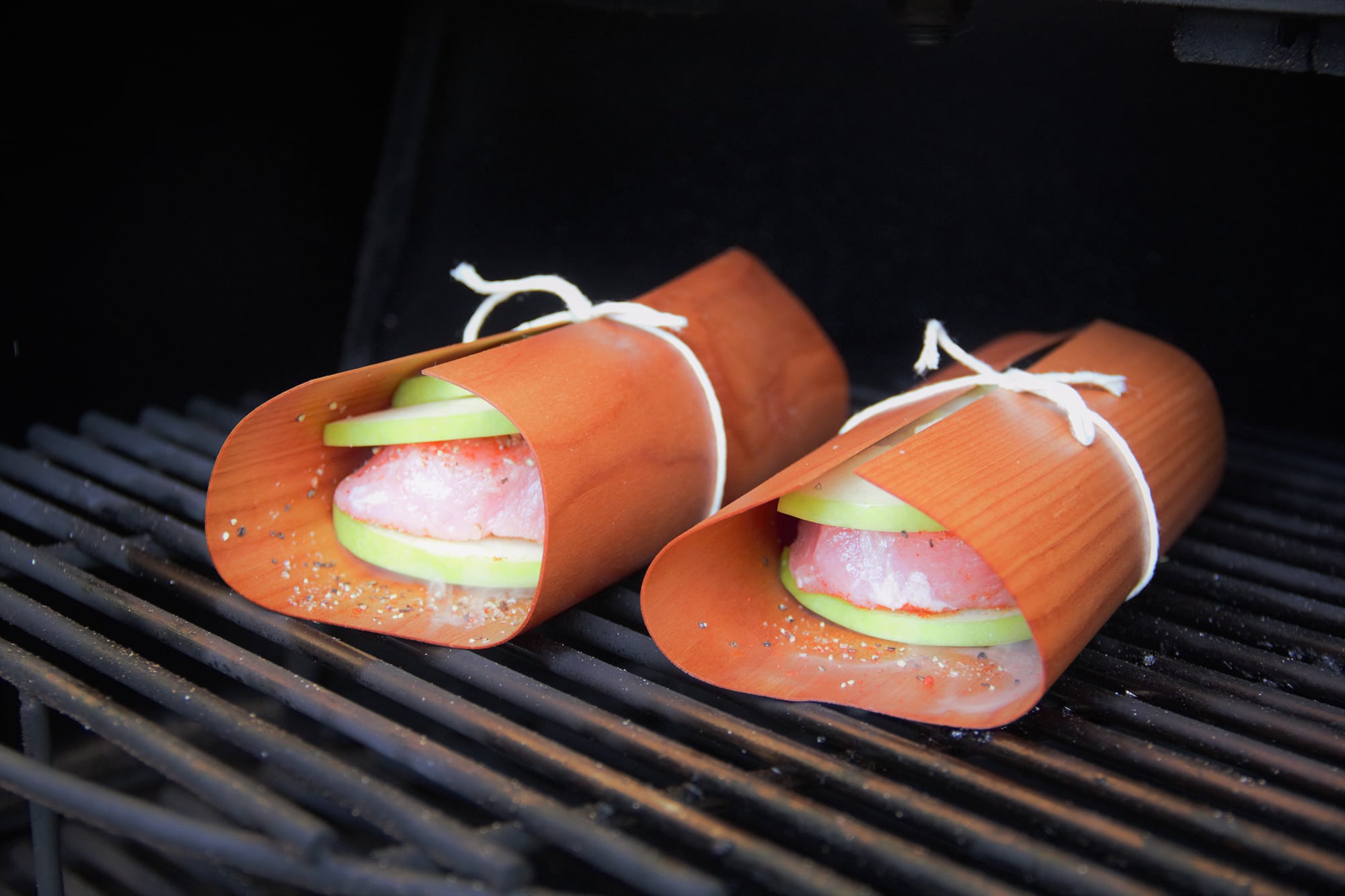 Wrapped pork steak with apple
